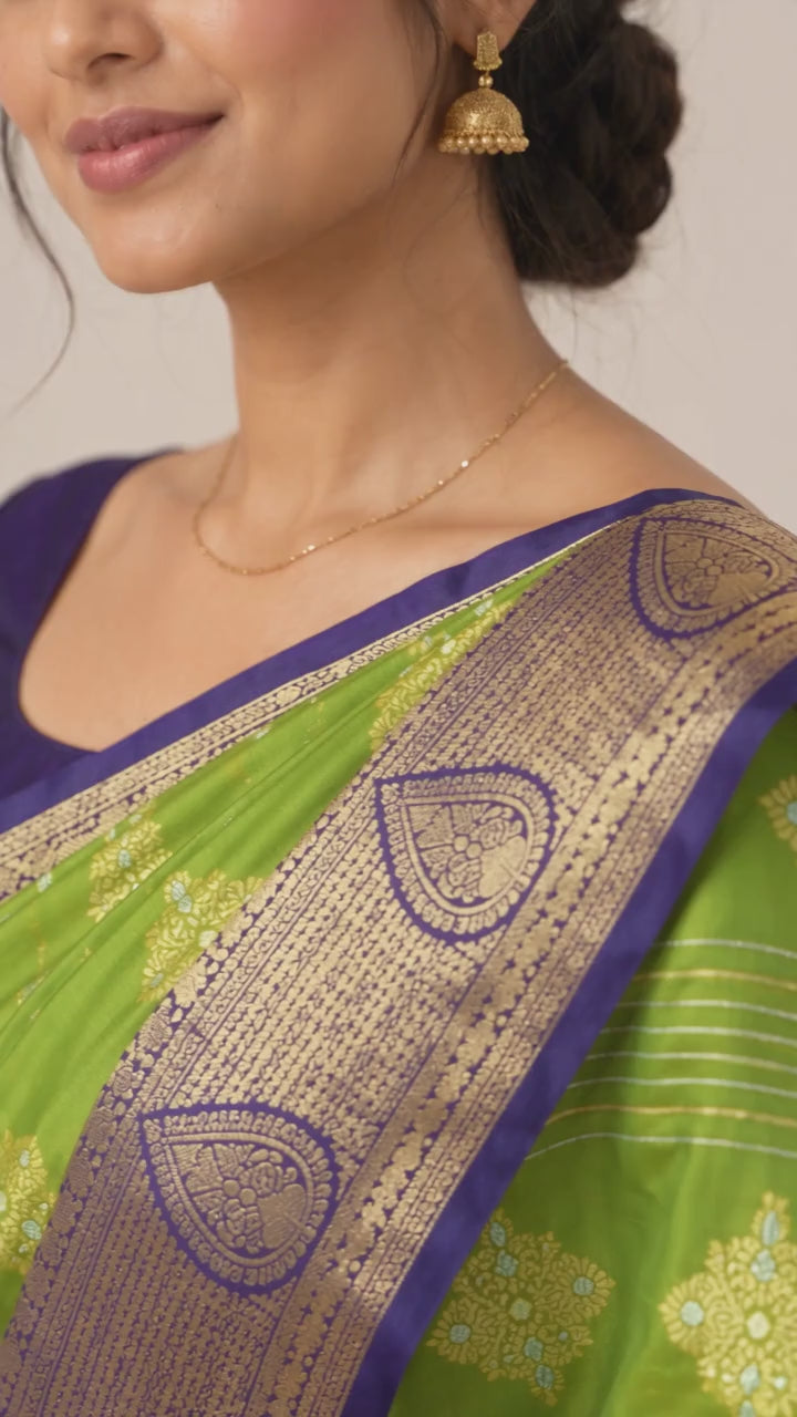 Lime green saree with purple blouse and naturally draped pallu