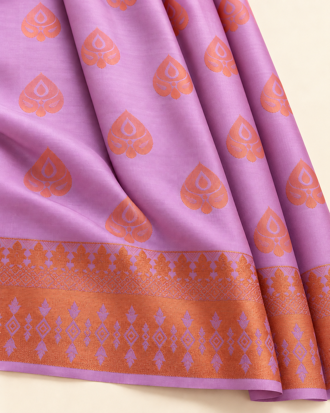 Lilac silk and copper motif and border detail