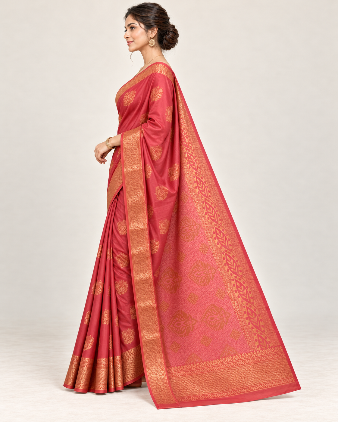 Side view of coral rose silk saree with copper pallu