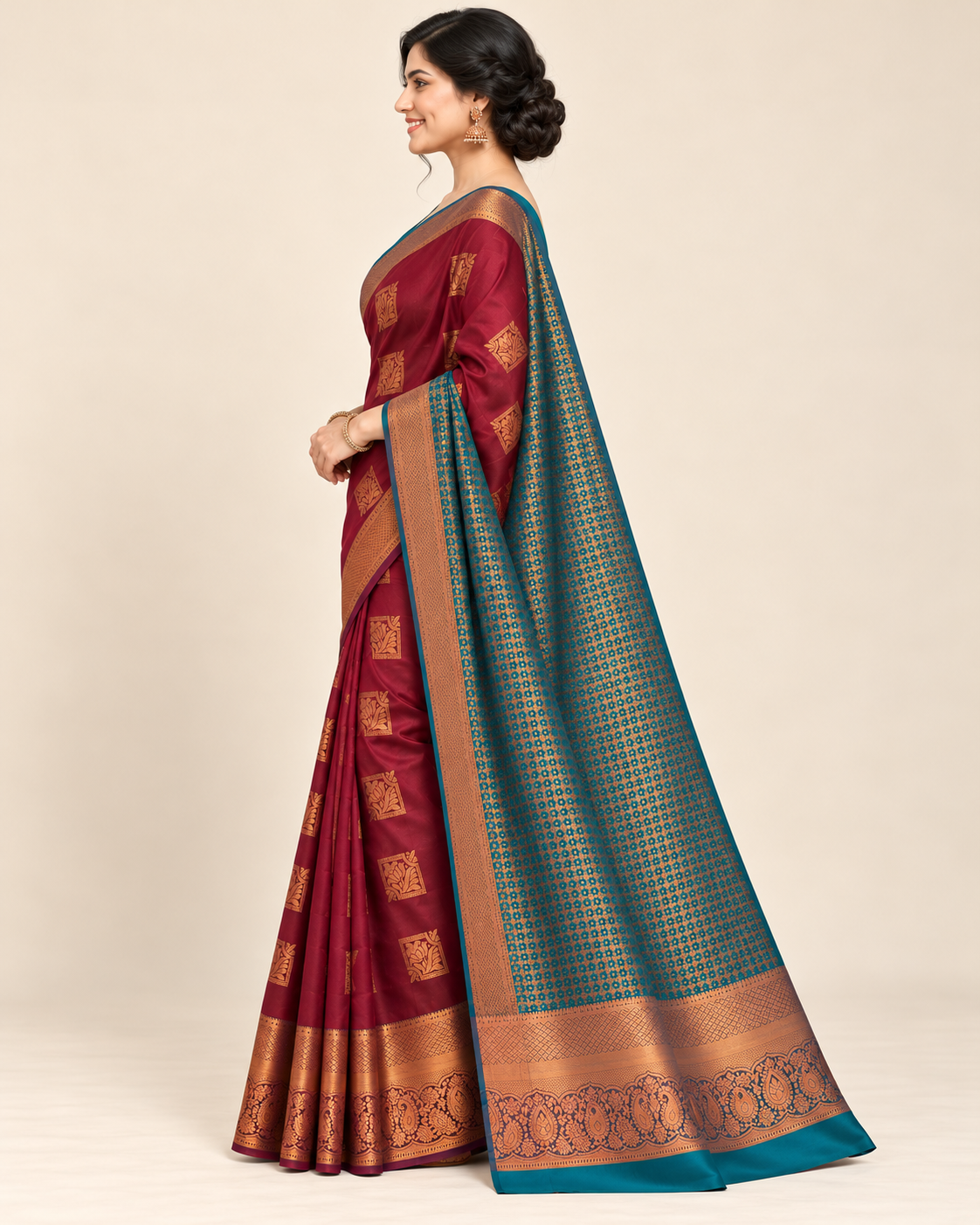 Side view showing saree drape and copper-toned border