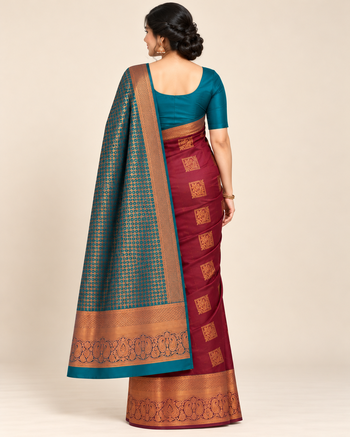 Back view of turquoise pallu and bordeaux silk saree