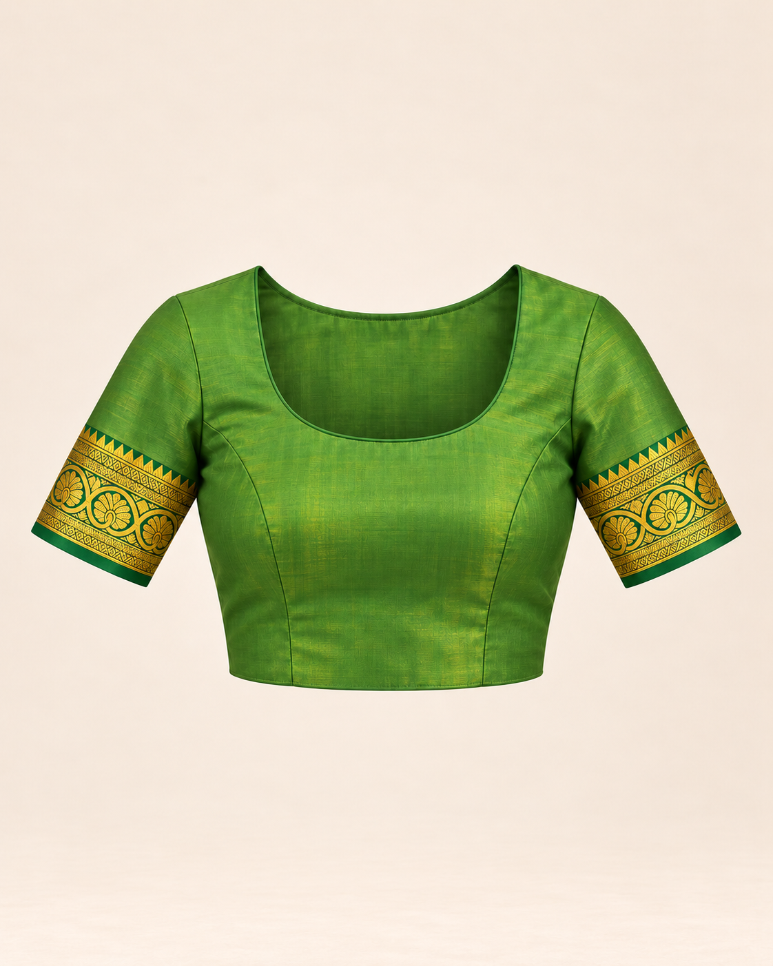 Green stitched example blouse with matching gold-tone sleeve borders; unstitched fabric included