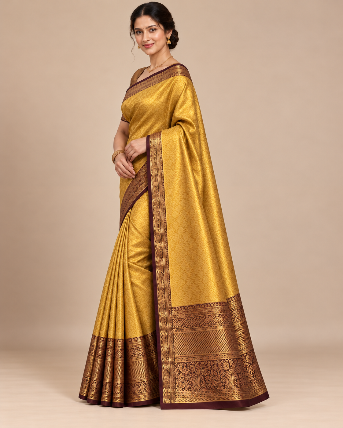 Three-quarter view of golden silk saree with bronze-gold styling blouse