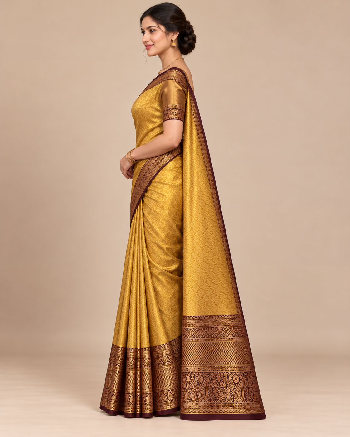 Side view of golden silk saree with patterned pallu