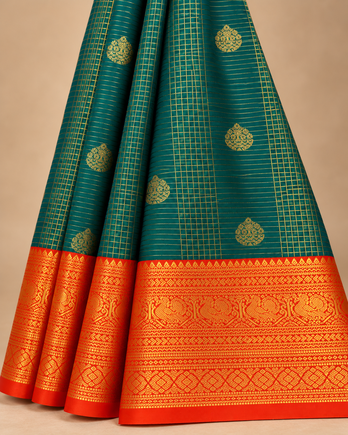 Close-up of teal checked silk and orange gold border
