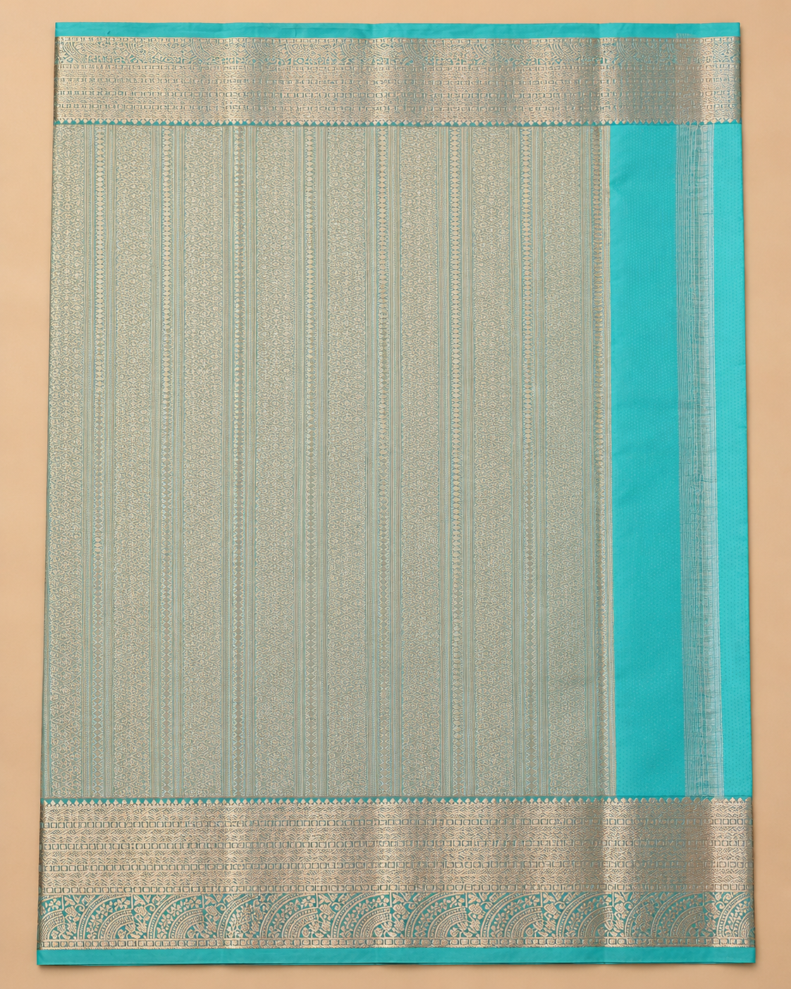 Turquoise and gold-toned striped pallu displayed in studio