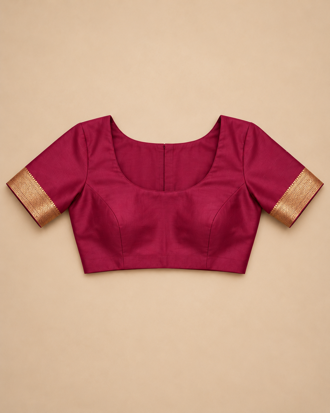 Matching wine-magenta stitched example blouse; unstitched fabric supplied