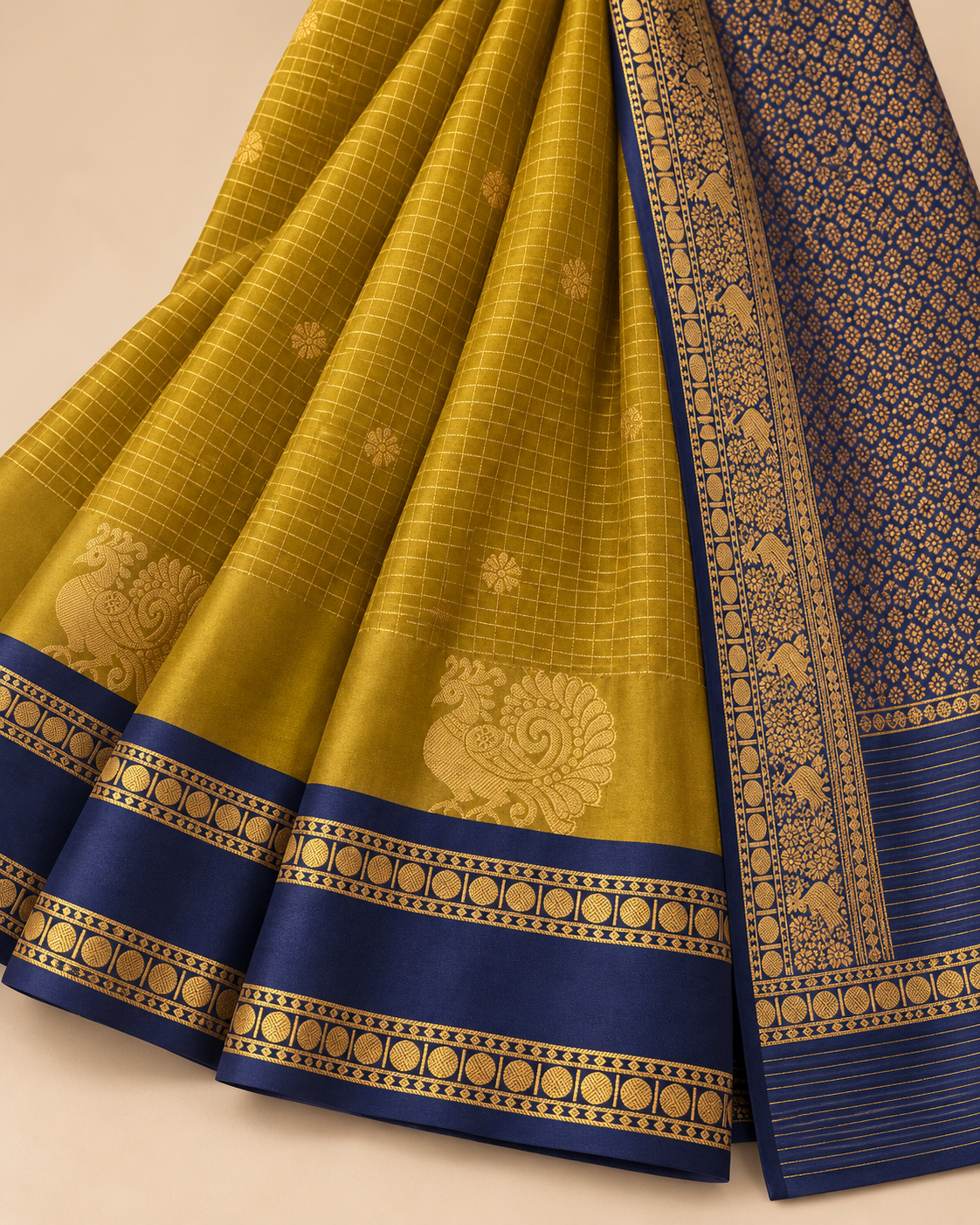 Close-up of gold peacock, fine checks and navy coin border