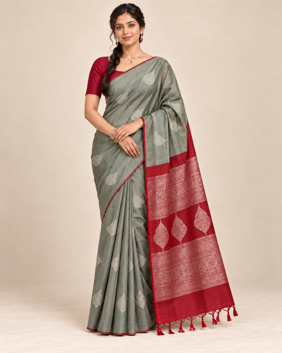 Front view of sage grey silk saree with red pallu