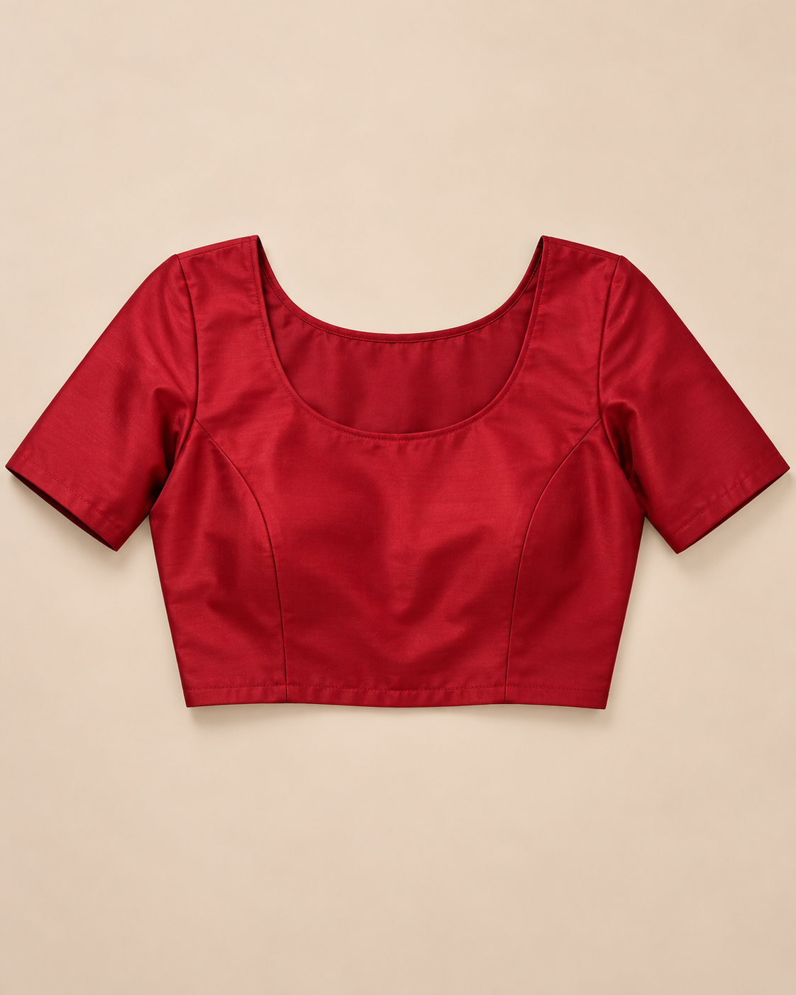Plain red stitched example blouse; unstitched fabric supplied