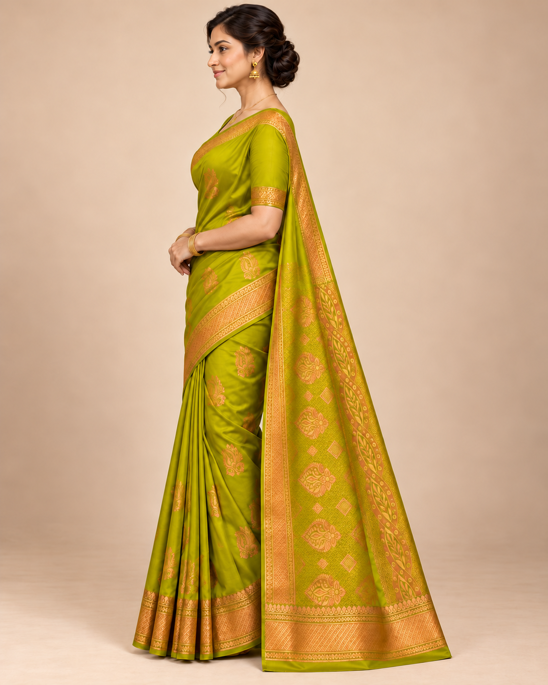 Chartreuse silk saree with gold paisley motifs — side view