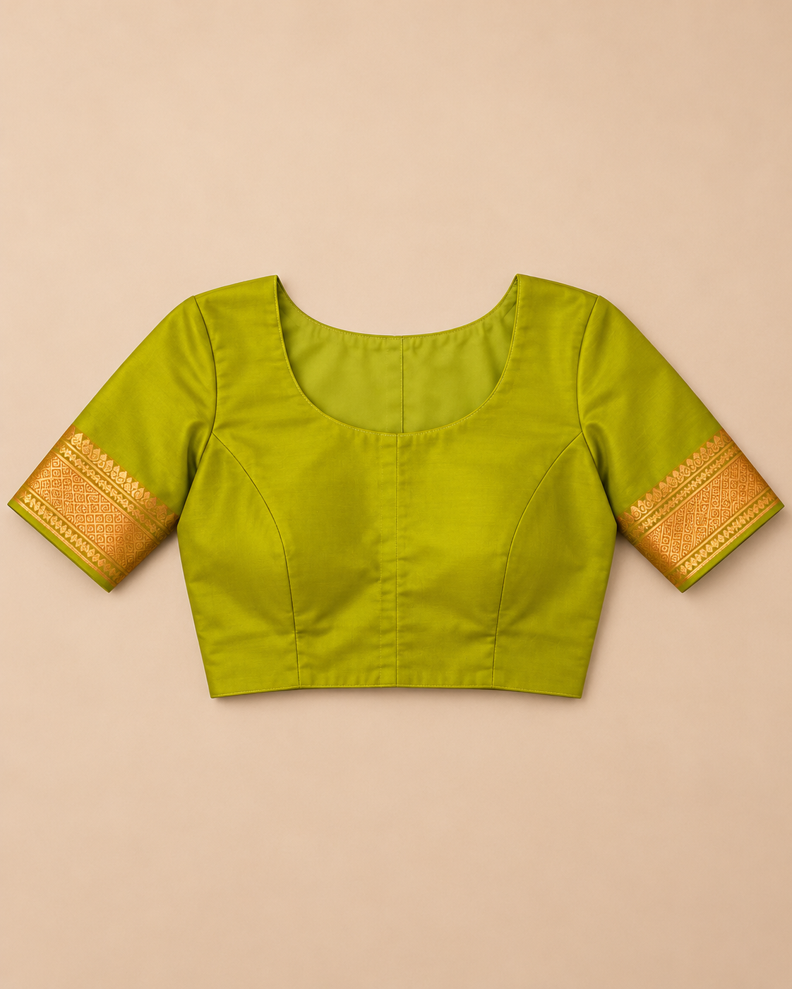 Chartreuse silk saree with gold paisley motifs — stitched blouse styling example