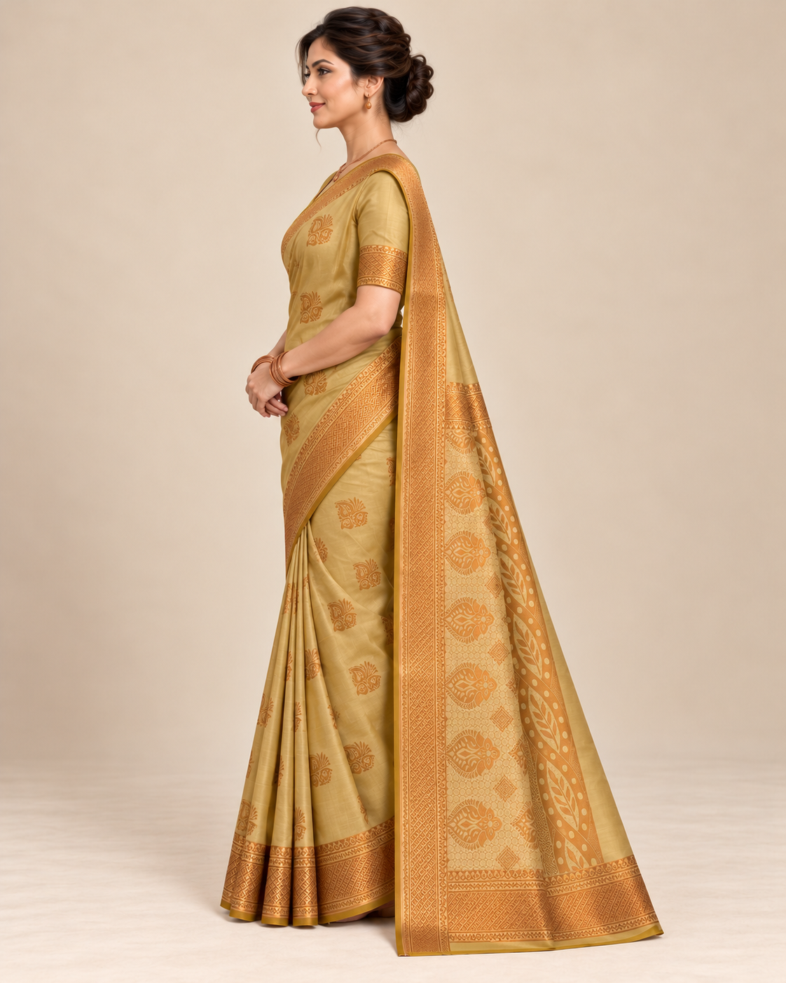 Side view — muted gold silk saree