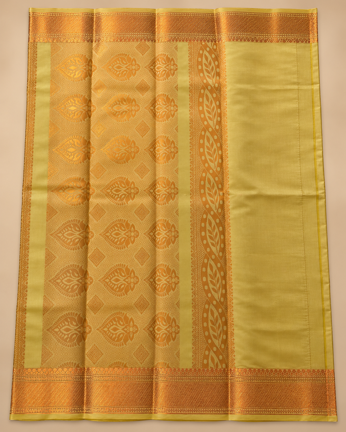 Patterned copper pallu — muted gold silk saree