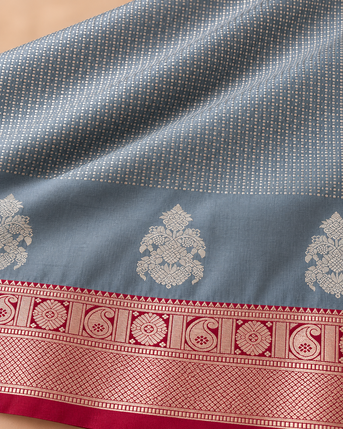 Woven motifs and border detail — blue grey and raspberry silk saree