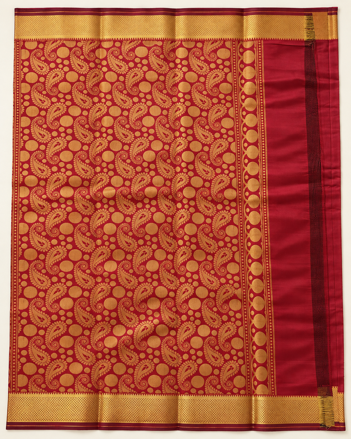 Wine maroon and gold pallu with paisley and circle motifs