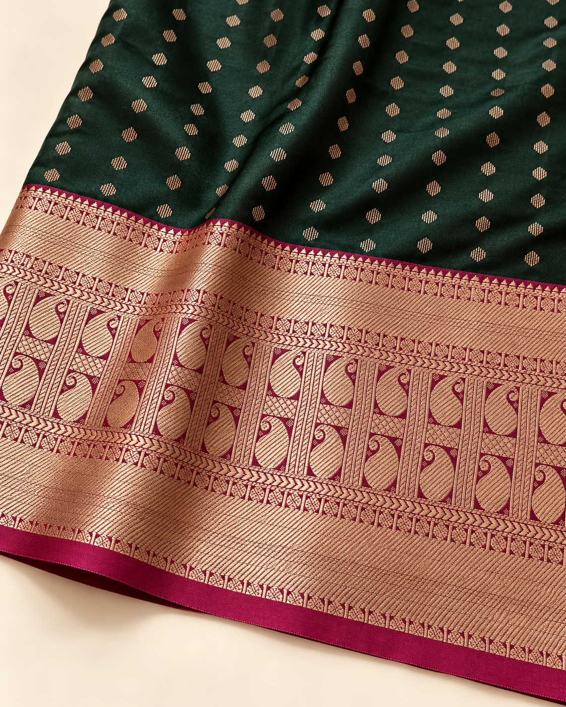 Close-up of green silk dots and the two-row paisley border
