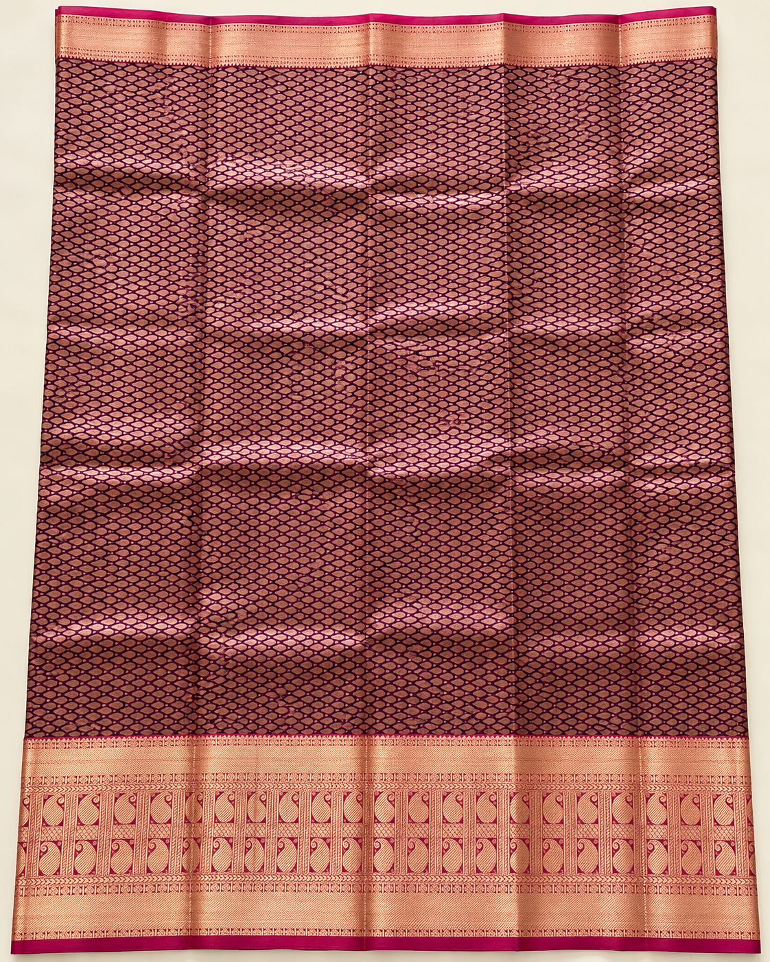 Full plum and copper patterned pallu with paisley borders