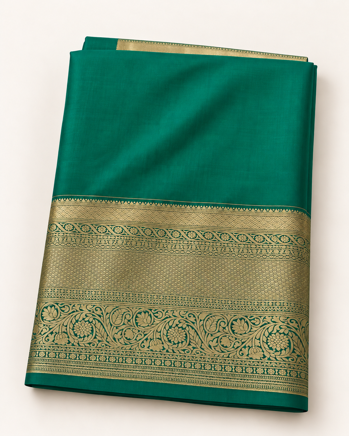 Included unstitched plain green blouse fabric with gold woven borders.