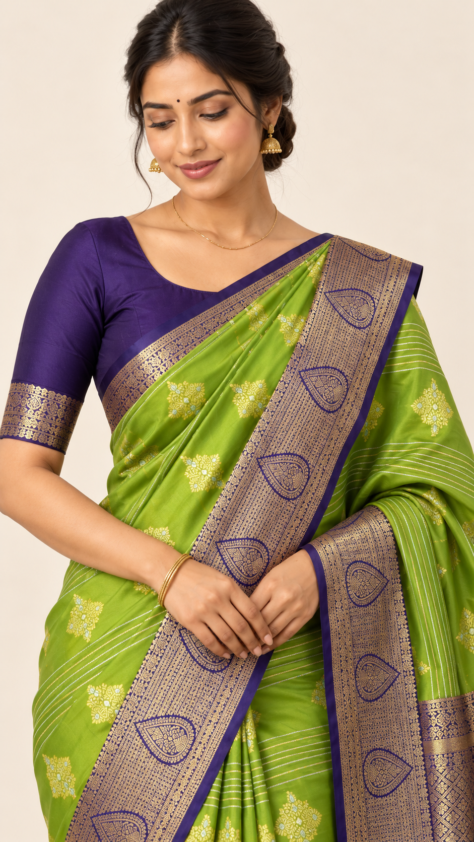 Close-up of green fabric and gold border