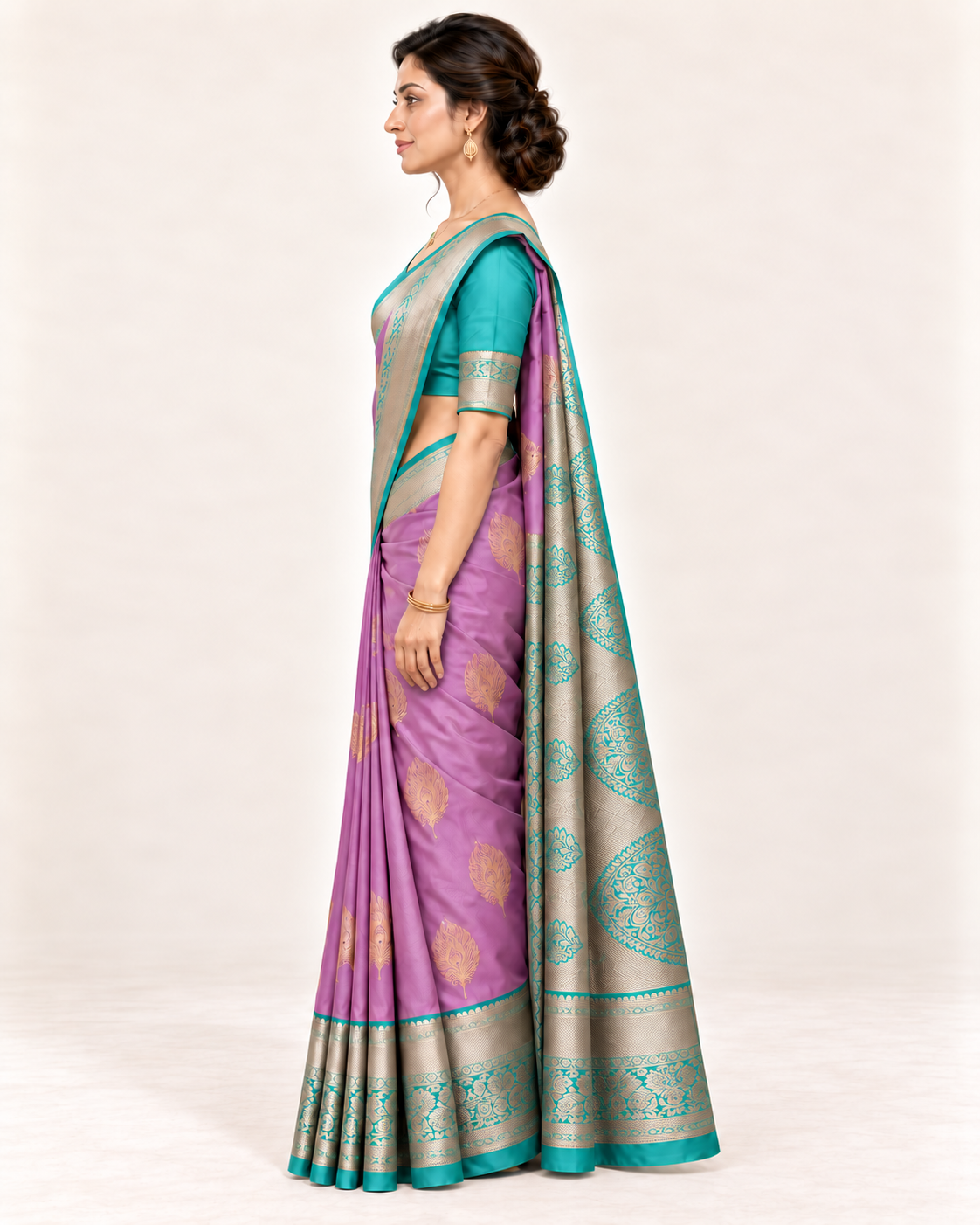 Lilac silk saree with gold feather motifs and contrasting turquoise border, side view