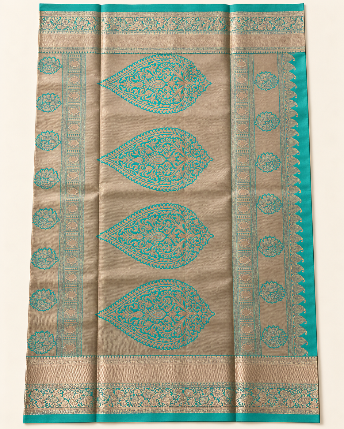 Champagne metallic pallu with four turquoise floral teardrop medallions and woven borders