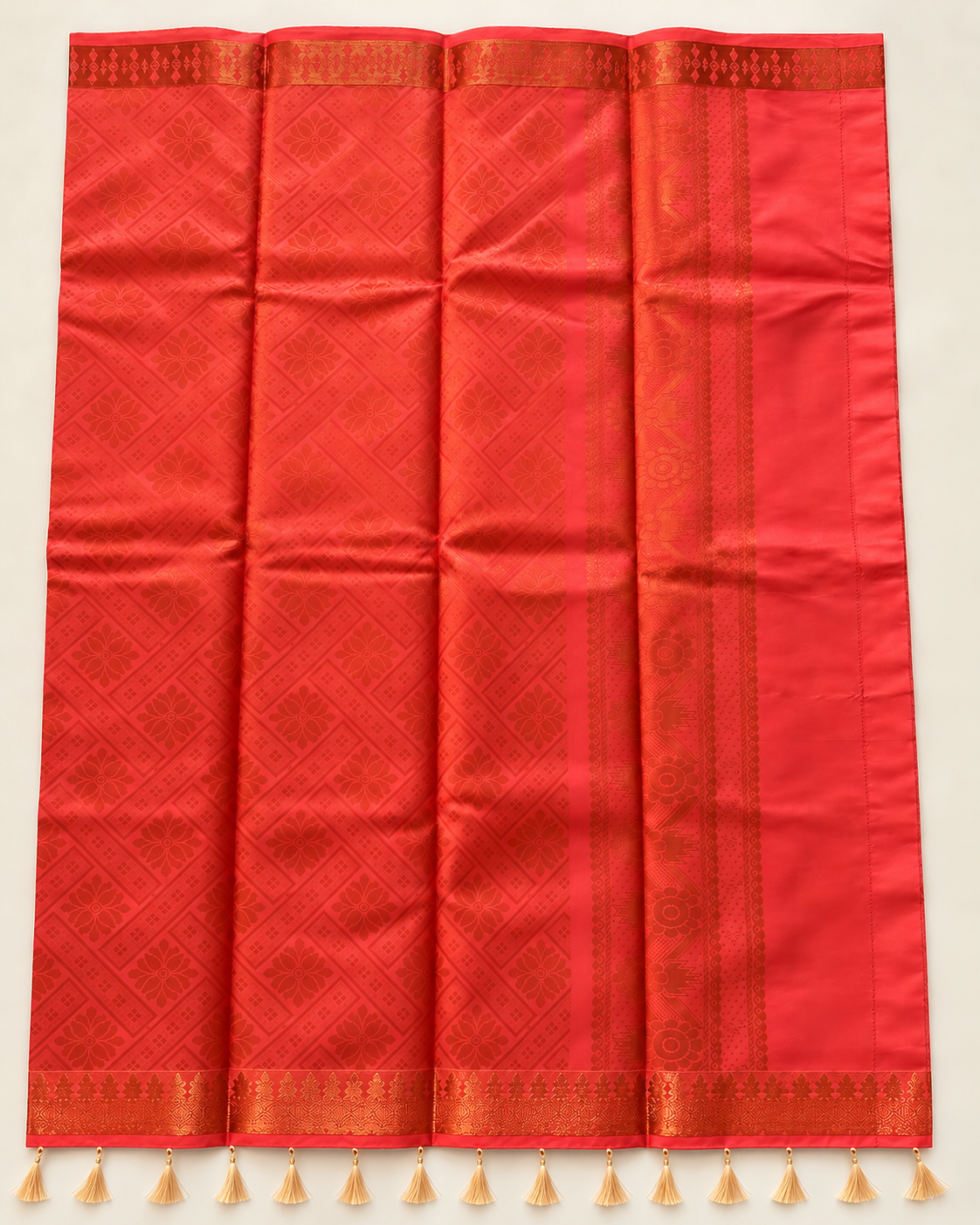 Coral pallu with copper floral diamond weaving and tassels