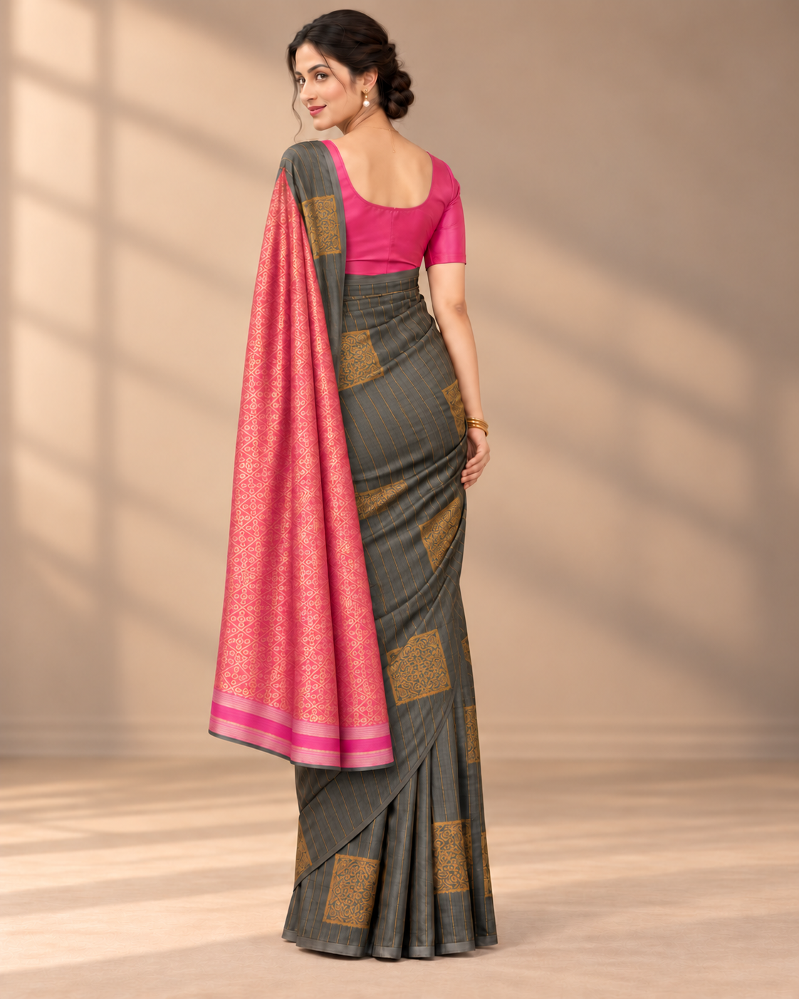 Back view — charcoal grey borderless silk saree